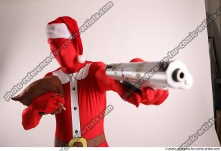 27 2018 01 JOEL ADAMSON CHRISTMAS HERO WITH GUN